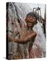 A Boy Takes Advantage of an Overflowing Firetruck Which was Used to Put out a Fire-null-Stretched Canvas