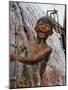 A Boy Takes Advantage of an Overflowing Firetruck Which was Used to Put out a Fire-null-Mounted Photographic Print