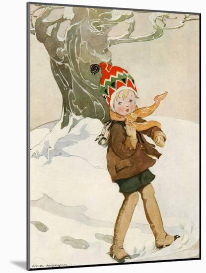 A Boy Walks Through the Snow Carrying Ice Skates-Anne Anderson-Mounted Art Print