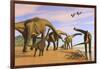 A Brachiosaurus Herd Walks Down a Wet Sandy Beach-null-Framed Art Print