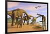 A Brachiosaurus Herd Walks Down a Wet Sandy Beach-null-Framed Art Print