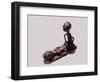 A brass weight which was used for weighing gold dust-null-Framed Giclee Print