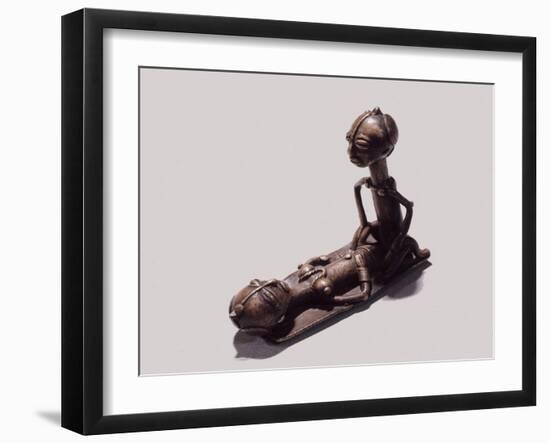 A brass weight which was used for weighing gold dust-null-Framed Giclee Print