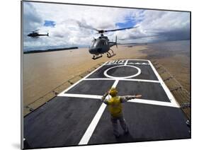 A Brazilian Eurocopter Prepares to Land Aboard a Brazilian Navy Hospital Ship-Stocktrek Images-Mounted Photographic Print