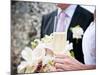 A Bride and Groom with a Glass of Champagne and a Bouquet-null-Mounted Photographic Print