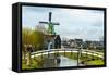 A Bridge Leading to a Village of Historic Homes in the Netherlands-Sheila Haddad-Framed Stretched Canvas