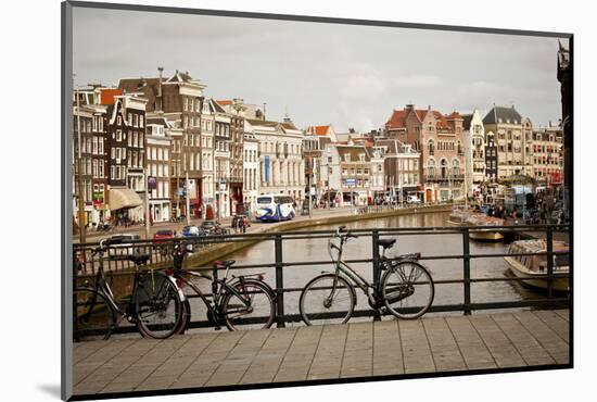 A Bridge over a Canal in Amsterdam, Netherlands-Carlo Acenas-Mounted Photographic Print