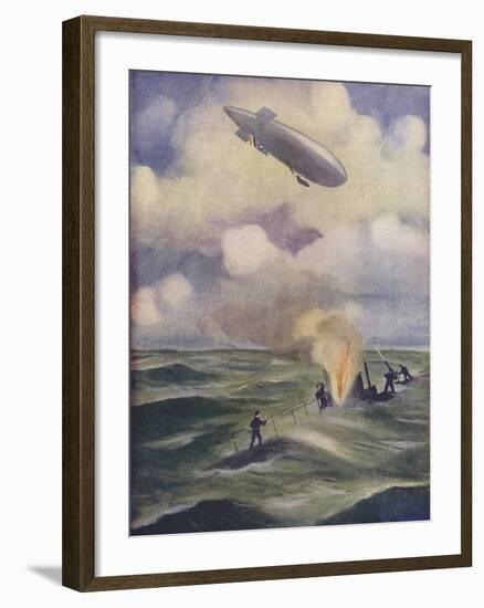 A British Naval Airship Bombing a Submarine-null-Framed Giclee Print