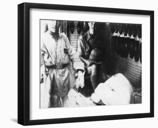 A British Officer in a Shoe Shop, Baghdad, Mesopotamia, WWI, 1918-null-Framed Giclee Print