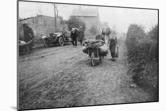 A British Soldier Helping a Woman Return to Her Village, France, 1918-null-Mounted Giclee Print