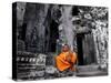 A Buddhist Monk Relaxes in the Bayon Temple, Angkor, Unesco World Heritage Site, Cambodia-Andrew Mcconnell-Stretched Canvas