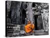 A Buddhist Monk Relaxes in the Bayon Temple, Angkor, Unesco World Heritage Site, Cambodia-Andrew Mcconnell-Stretched Canvas