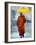 A Buddhist Monk Walks in the Rain on a Street in Bangkok-null-Framed Photographic Print