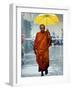 A Buddhist Monk Walks in the Rain on a Street in Bangkok-null-Framed Photographic Print
