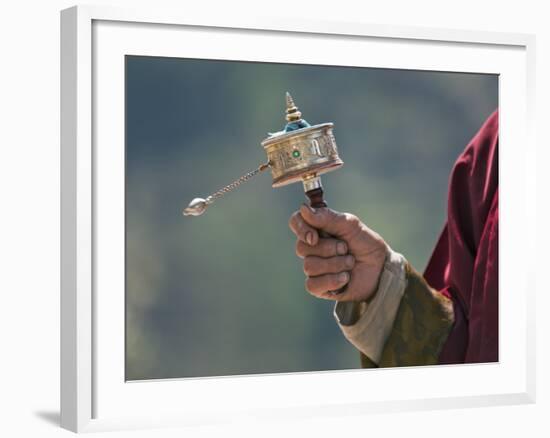 A Buddhist Spins His Hand-Held Prayer Wheel in a Clockwise Direction with the Help of a Weighted Ch-Nigel Pavitt-Framed Photographic Print