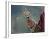 A Buddhist Spins His Hand-Held Prayer Wheel in a Clockwise Direction with the Help of a Weighted Ch-Nigel Pavitt-Framed Photographic Print