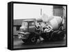 A Builder Climbing into a Ready-Mix Concrete Transporter Lorry-null-Framed Stretched Canvas