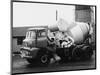 A Builder Climbing into a Ready-Mix Concrete Transporter Lorry-null-Mounted Photographic Print