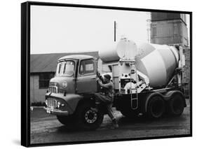 A Builder Climbing into a Ready-Mix Concrete Transporter Lorry-null-Framed Stretched Canvas