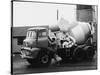 A Builder Climbing into a Ready-Mix Concrete Transporter Lorry-null-Stretched Canvas