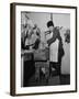 A Butcher Working in the Hungarian Meat Shop-John Phillips-Framed Premium Photographic Print