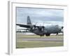 A C-130 Hercules Lands at McChord Air Force Base, Washington-Stocktrek Images-Framed Photographic Print