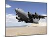 A C-17 Globemaster Departs from the Tonopah Runway-Stocktrek Images-Mounted Photographic Print