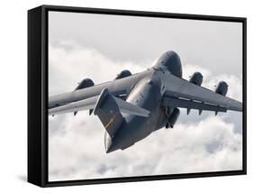 A C-17 Globemaster Flying Above the Clouds over Nellis Air Force Base, Nevada-Stocktrek Images-Framed Stretched Canvas