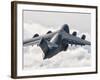 A C-17 Globemaster Flying Above the Clouds over Nellis Air Force Base, Nevada-Stocktrek Images-Framed Photographic Print