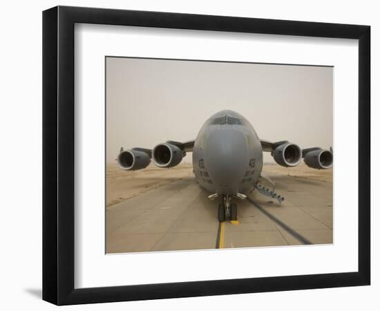 A C-17 Globemaster Iii Sits on the Runway at Cob Speicher, Iraq-null-Framed Photographic Print