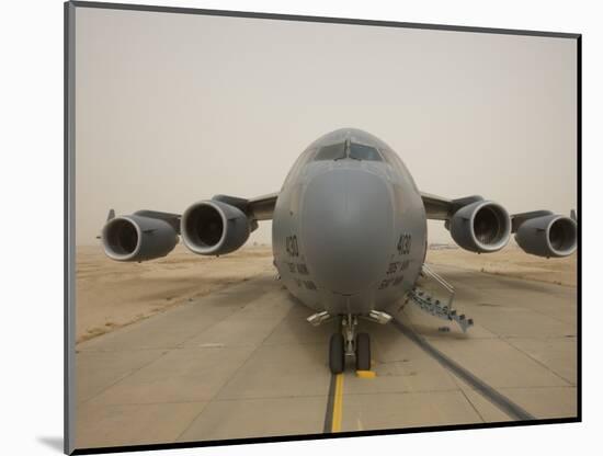 A C-17 Globemaster Iii Sits on the Runway at Cob Speicher, Iraq-null-Mounted Photographic Print