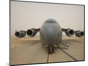 A C-17 Globemaster Iii Sits on the Runway at Cob Speicher, Iraq-null-Mounted Photographic Print