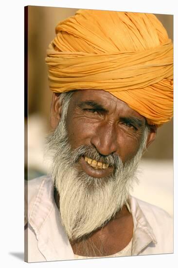 A Camel Breeder at the Pushkar Camel Fair, Rajasthan, Pushkar, India-David Noyes-Stretched Canvas