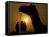 A Camel Stands as Villagers Walk at Sunrise at the Annual Cattle Fair in Pushkar, November 3, 2006-Rajesh Kumar Singh-Framed Stretched Canvas