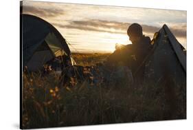 A camper sits in the evening sun, Picws Du, Black Mountain, Brecon Beacons National Park, Wales, Un-Charlie Harding-Stretched Canvas