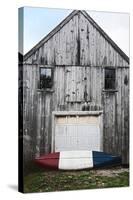 A Canoe Sits In Front Of A Weathered Old Boat House On The Coast Of Maine-Erik Kruthoff-Stretched Canvas