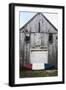 A Canoe Sits In Front Of A Weathered Old Boat House On The Coast Of Maine-Erik Kruthoff-Framed Photographic Print