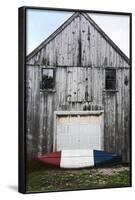 A Canoe Sits In Front Of A Weathered Old Boat House On The Coast Of Maine-Erik Kruthoff-Framed Photographic Print