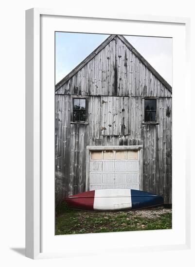 A Canoe Sits In Front Of A Weathered Old Boat House On The Coast Of Maine-Erik Kruthoff-Framed Photographic Print