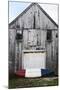 A Canoe Sits In Front Of A Weathered Old Boat House On The Coast Of Maine-Erik Kruthoff-Mounted Photographic Print