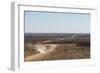 A Car Leaves a Cloud of Dust as it Apporachs Along the Long Dusty Road from the Fish River Canyon-Alex Treadway-Framed Photographic Print