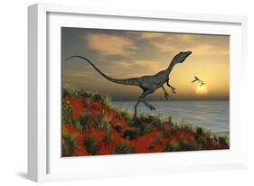 A Carnivorous Compsognathus Dinosaur-null-Framed Art Print
