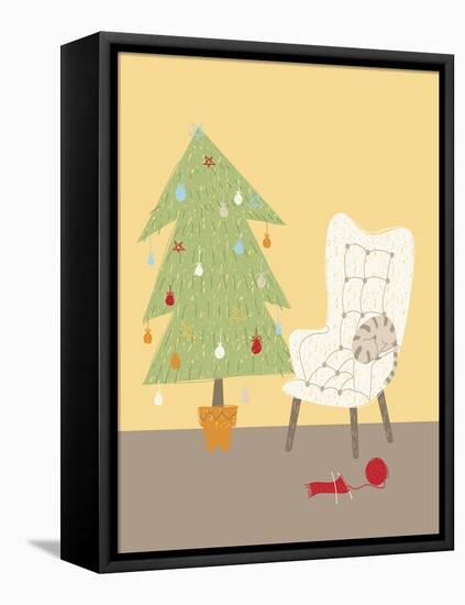 A Cat on a Chair Next to a Christmas Tree-null-Framed Stretched Canvas