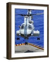 A CH-46E Sea Knight Helicopter Prepares To Land On the Flight Deck of USS Peleliu-Stocktrek Images-Framed Photographic Print