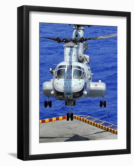 A CH-46E Sea Knight Helicopter Prepares To Land On the Flight Deck of USS Peleliu-Stocktrek Images-Framed Photographic Print