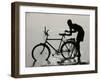 A Chadian Man Washes His Bicycle-null-Framed Premium Photographic Print