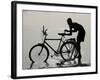 A Chadian Man Washes His Bicycle-null-Framed Photographic Print