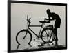 A Chadian Man Washes His Bicycle-null-Framed Photographic Print