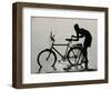 A Chadian Man Washes His Bicycle-null-Framed Photographic Print