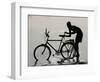 A Chadian Man Washes His Bicycle-null-Framed Photographic Print